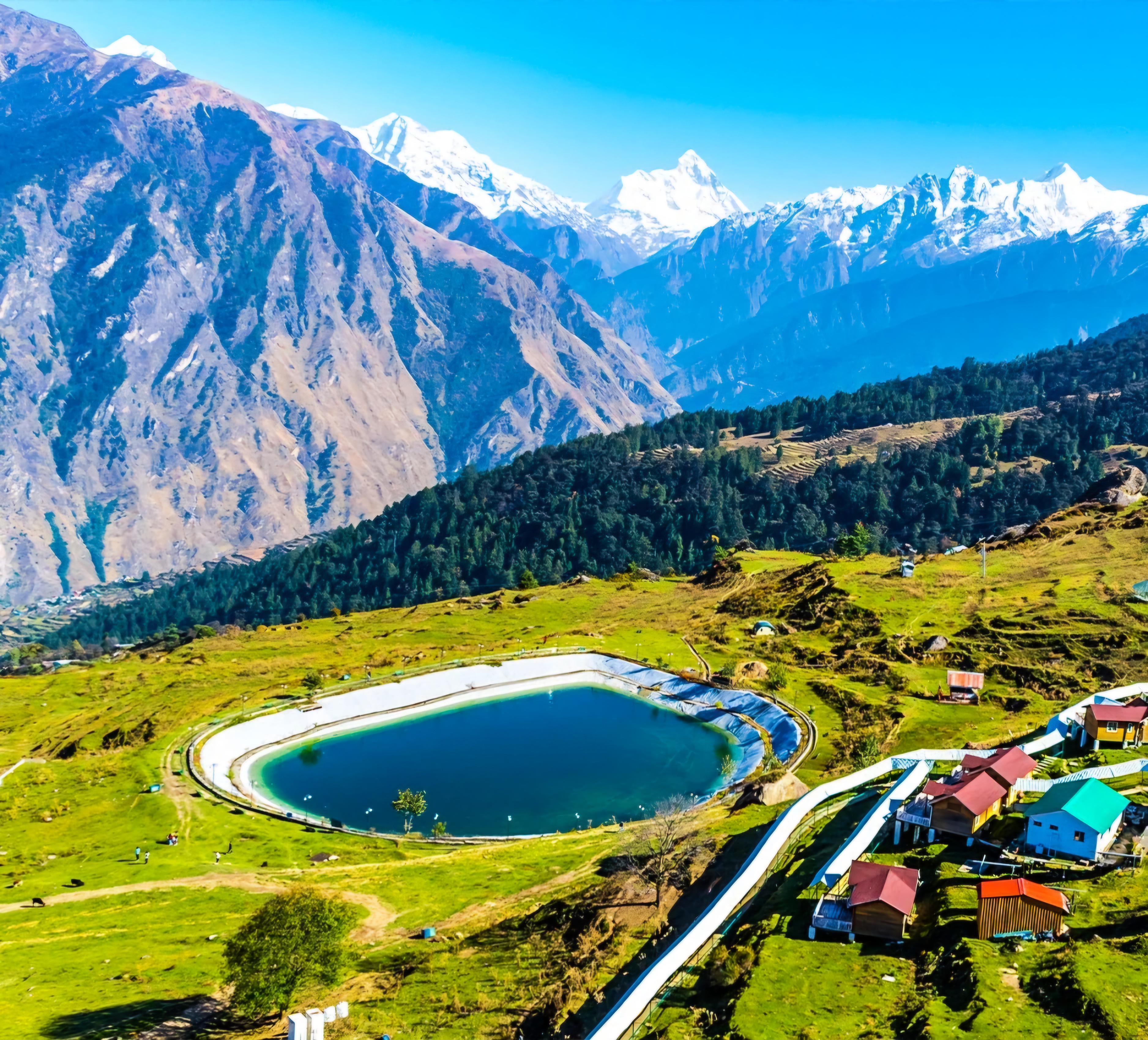 The snow-capped peak of Nanda Devi seen from Auli, representing a celestial Uttarakhand tour.